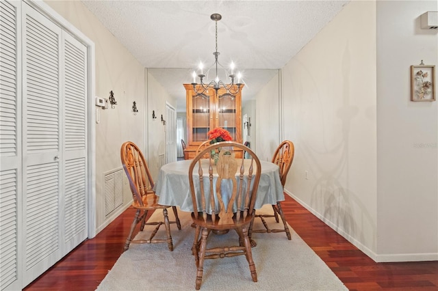 12804 Wedgewood Way Unit C, Hudson, FL 34667 - dining room with a chandelier, wood finished floors, and baseboards