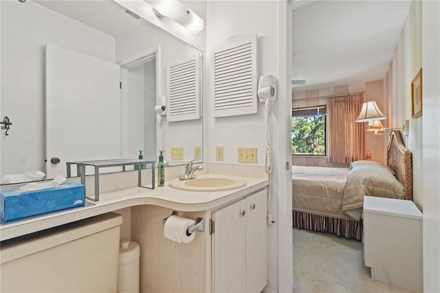 12804 Wedgewood Way Unit C, Hudson, FL 34667 - ensuite bathroom featuring vanity and toilet