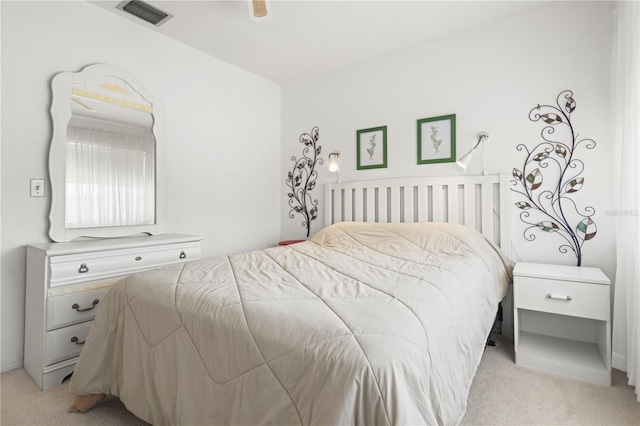 12804 Wedgewood Way Unit C, Hudson, FL 34667 - bedroom featuring light colored carpet