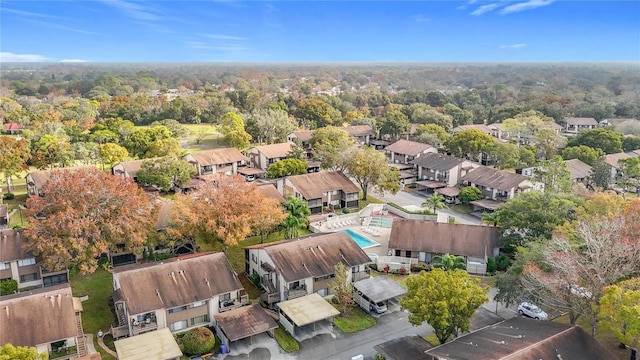 12804 Wedgewood Way Unit C, Hudson, FL 34667 - aerial perspective of suburban area with a heavily wooded area