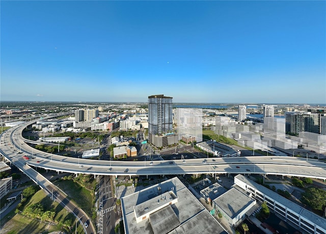 birds eye view of property with a view of city