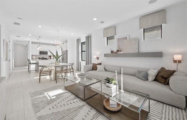 living area with recessed lighting and plenty of natural light