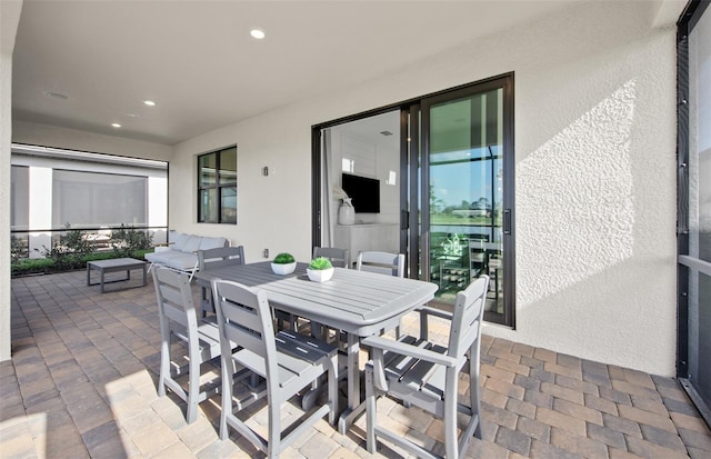 view of patio with outdoor dining area