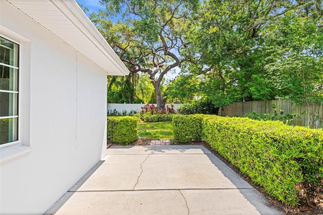 view of patio / terrace featuring fence