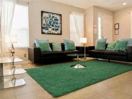 1030 Marcello Blvd, Kissimmee, FL 34746 - living area with tile patterned flooring
