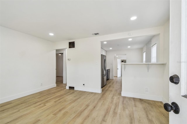 3535 16th St N, Saint Petersburg, FL 33704 - spare room with light wood finished floors, baseboards, and recessed lighting