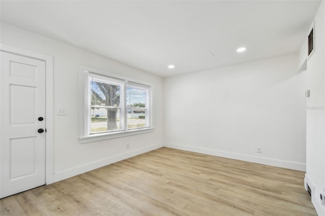 3535 16th St N, Saint Petersburg, FL 33704 - entryway with baseboards, light wood finished floors, and recessed lighting