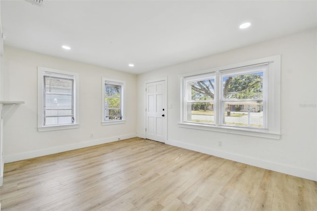 3535 16th St N, Saint Petersburg, FL 33704 - entrance foyer featuring light wood finished floors, baseboards, and recessed lighting