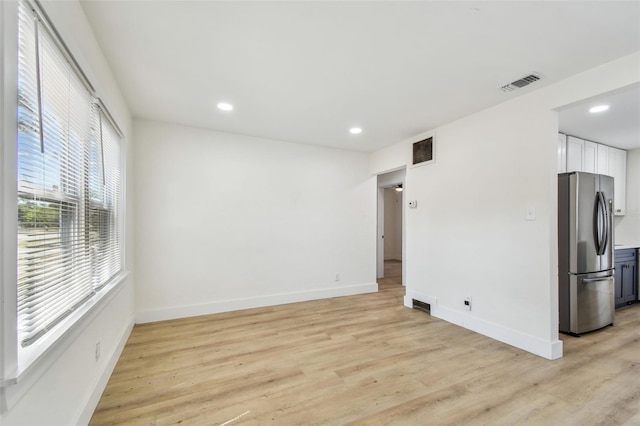 3535 16th St N, Saint Petersburg, FL 33704 - unfurnished room with light wood-type flooring, baseboards, and recessed lighting