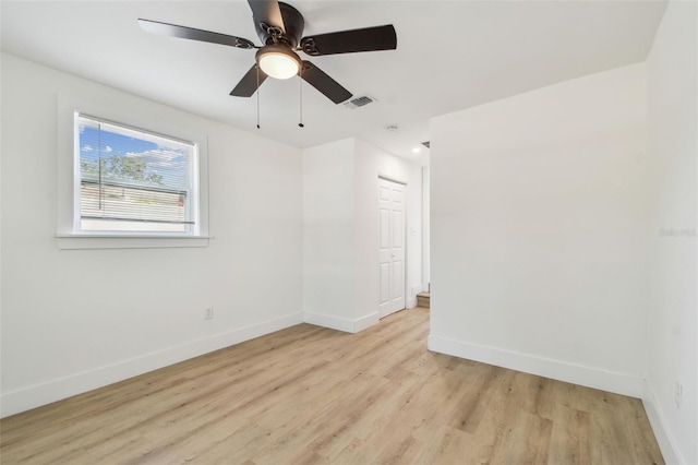 3535 16th St N, Saint Petersburg, FL 33704 - spare room with light wood finished floors, baseboards, and a ceiling fan