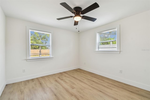 3535 16th St N, Saint Petersburg, FL 33704 - unfurnished room with baseboards, light wood-type flooring, and ceiling fan