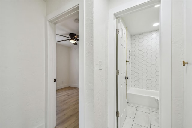 3535 16th St N, Saint Petersburg, FL 33704 - hall featuring a textured wall and baseboards