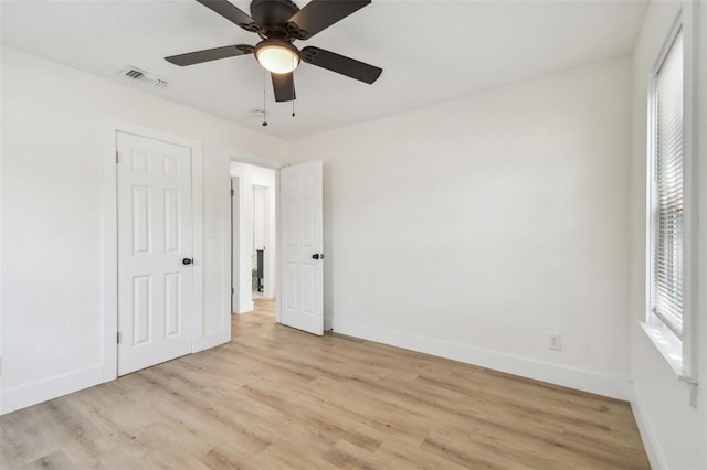 3535 16th St N, Saint Petersburg, FL 33704 - unfurnished bedroom with baseboards and light wood-style floors