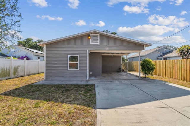 3535 16th St N, Saint Petersburg, FL 33704 - view of front of home featuring driveway and a carport