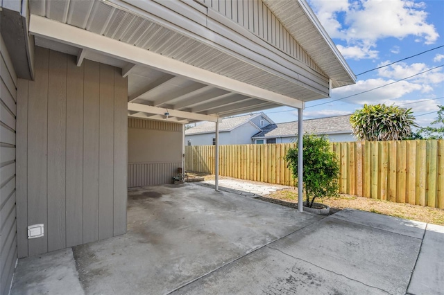 3535 16th St N, Saint Petersburg, FL 33704 - fenced backyard featuring a patio area