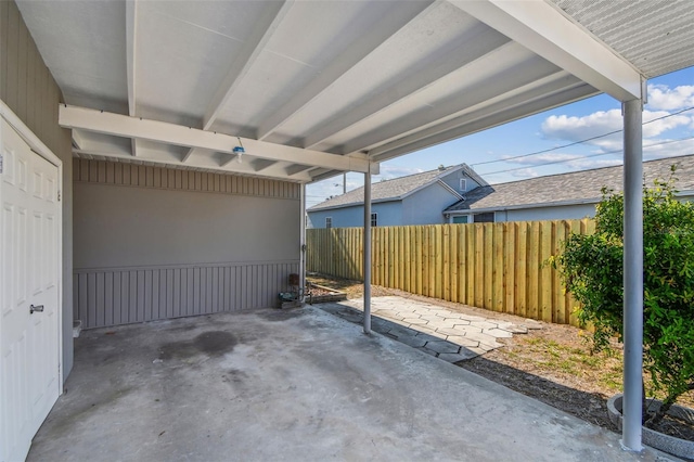 3535 16th St N, Saint Petersburg, FL 33704 - view of patio / terrace featuring a carport