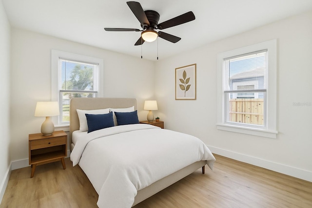 3535 16th St N, Saint Petersburg, FL 33704 - bedroom featuring light wood-style flooring, baseboards, and ceiling fan