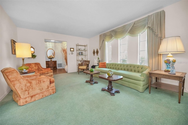 living area with carpet flooring and baseboards