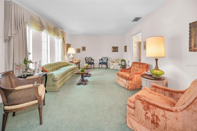 living area with carpet flooring