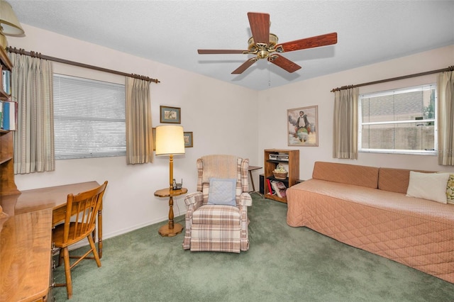 carpeted bedroom with baseboards and a ceiling fan