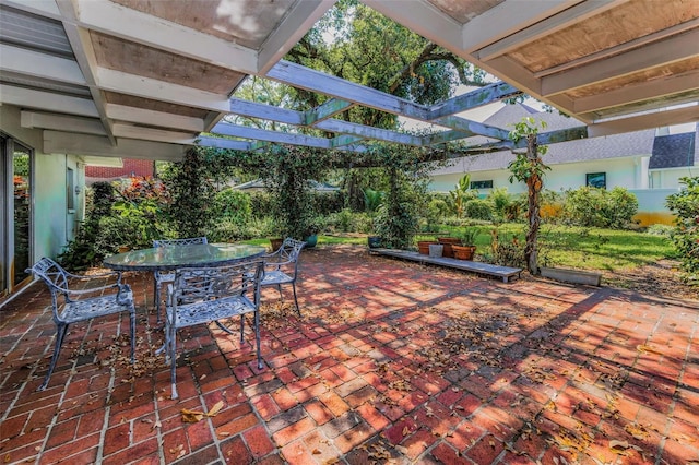 view of patio / terrace featuring outdoor dining area and a pergola