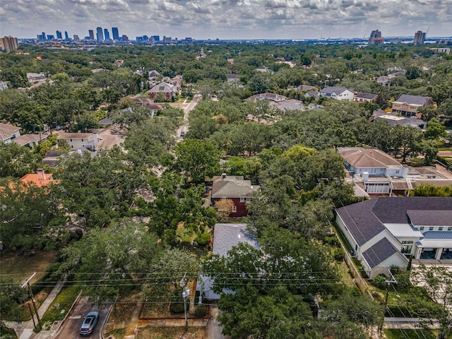 bird's eye view of a skyline view and a tree filled landscape