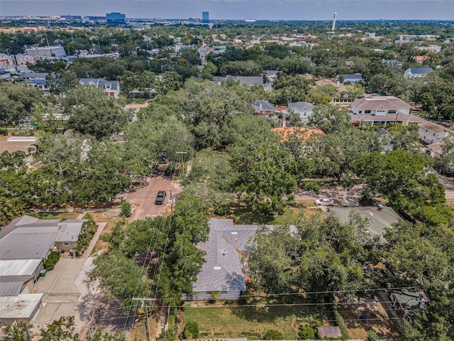 drone / aerial view of a tree filled landscape