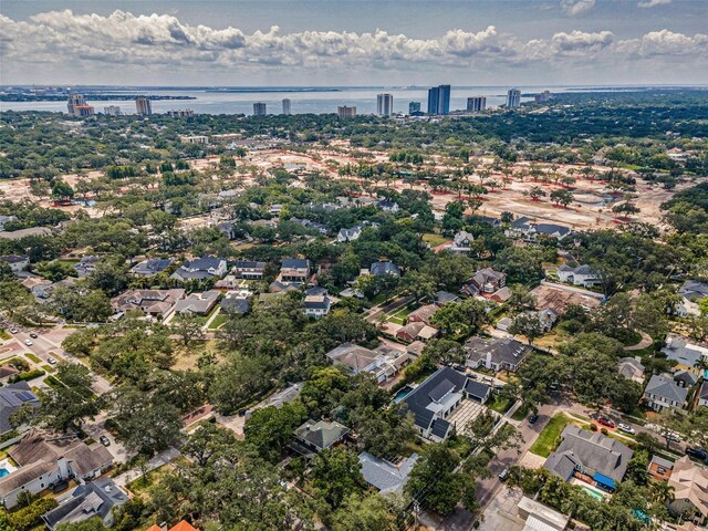 view of urban area featuring a large body of water