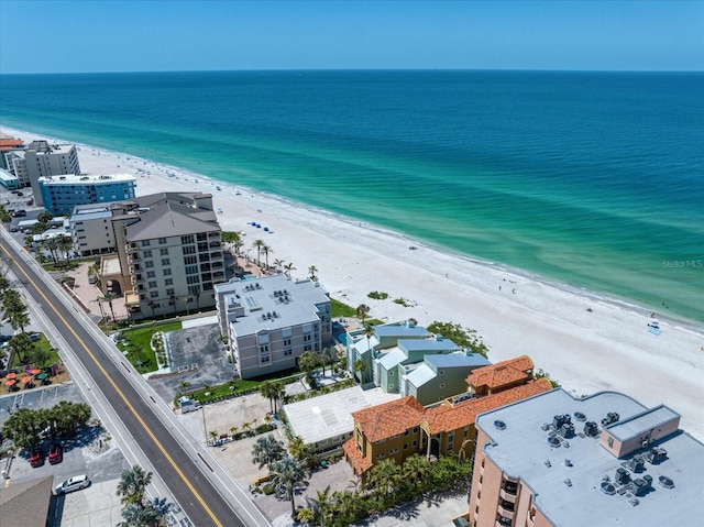 aerial view featuring a water view and a view of the beach