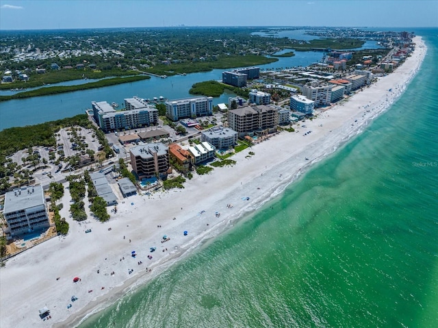 drone / aerial view featuring a view of the beach and a water view