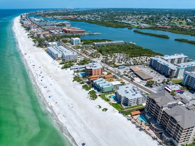 bird's eye view featuring a water view and a view of the beach