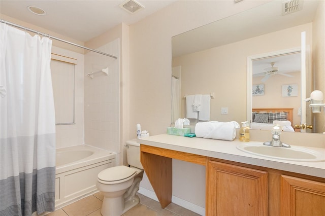 full bathroom featuring tile patterned flooring, vanity, toilet, shower / bath combo, and ceiling fan