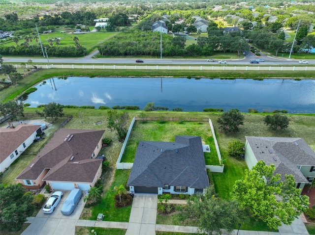 aerial view featuring a water view and a residential view