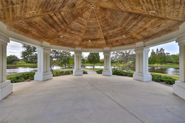view of patio featuring a water view