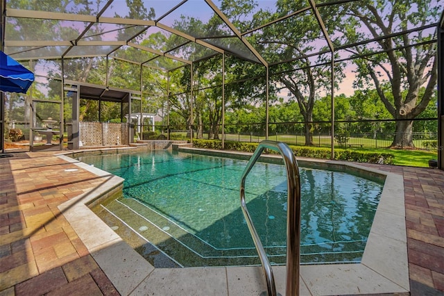 2769 St Andrews Blvd, Tarpon Springs, FL 34688 - view of swimming pool with a patio, glass enclosure, and a fenced backyard