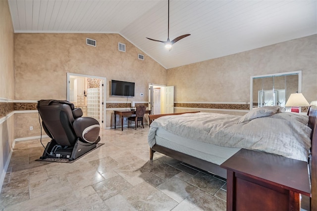 2769 St Andrews Blvd, Tarpon Springs, FL 34688 - bedroom featuring vaulted ceiling, stone tile flooring, and a ceiling fan