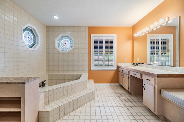 2769 St Andrews Blvd, Tarpon Springs, FL 34688 - bathroom with tile patterned flooring, baseboards, vanity, healthy amount of natural light, and recessed lighting