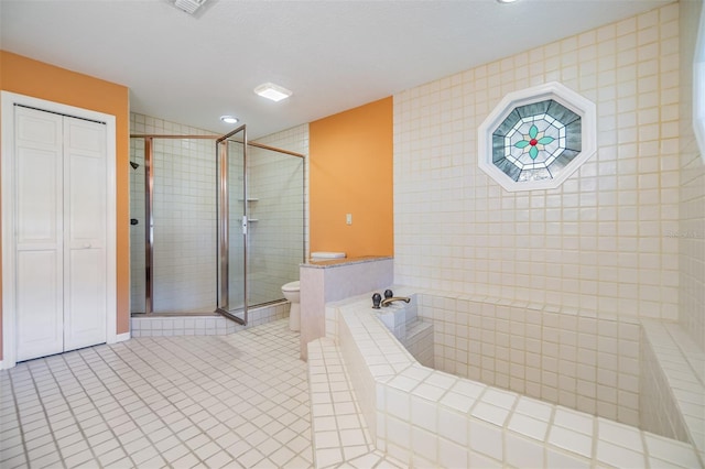 2769 St Andrews Blvd, Tarpon Springs, FL 34688 - full bathroom with a stall shower, tile patterned floors, toilet, a garden tub, and recessed lighting