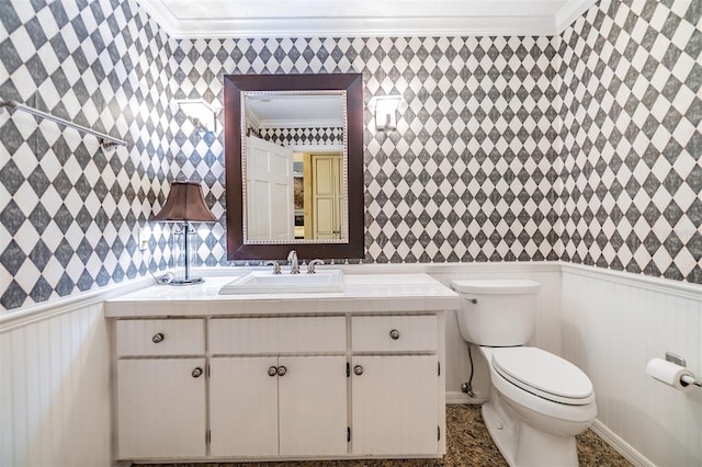 2769 St Andrews Blvd, Tarpon Springs, FL 34688 - bathroom with crown molding, toilet, and vanity