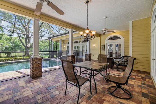 2769 St Andrews Blvd, Tarpon Springs, FL 34688 - sunroom featuring french doors and healthy amount of natural light