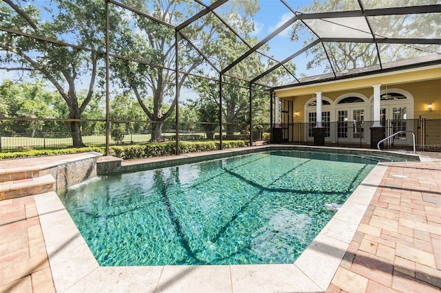 2769 St Andrews Blvd, Tarpon Springs, FL 34688 - view of pool with french doors, a patio area, and glass enclosure