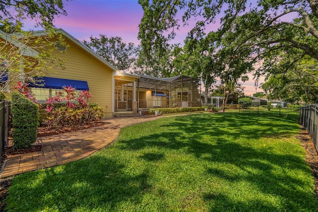 2769 St Andrews Blvd, Tarpon Springs, FL 34688 - view of yard featuring glass enclosure