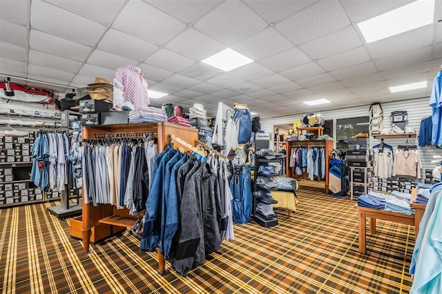 2769 St Andrews Blvd, Tarpon Springs, FL 34688 - miscellaneous room featuring a paneled ceiling and carpet floors