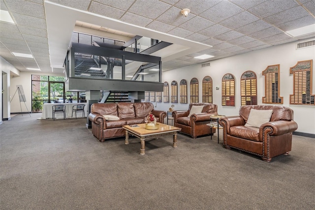 2769 St Andrews Blvd, Tarpon Springs, FL 34688 - carpeted living area featuring a paneled ceiling