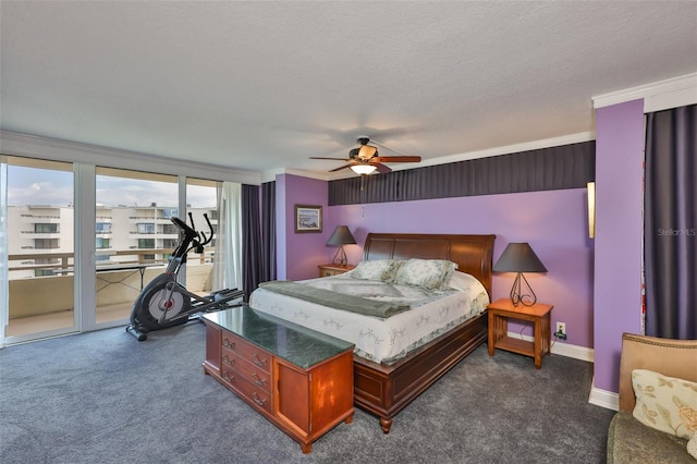 5701 Mariner St Unit 701, Tampa, FL 33609 - bedroom with access to exterior, dark carpet, a textured ceiling, crown molding, and ceiling fan