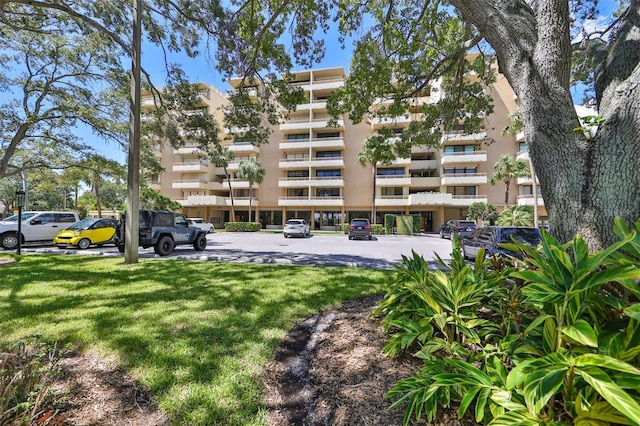 5701 Mariner St Unit 701, Tampa, FL 33609 - view of apartment building / complex with uncovered parking