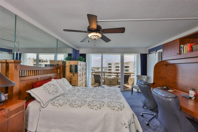 5701 Mariner St Unit 701, Tampa, FL 33609 - carpeted bedroom featuring a barn door, ornamental molding, a textured ceiling, and an office area