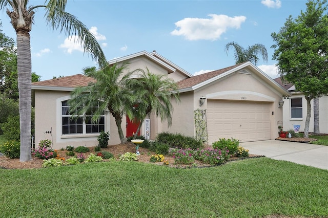 13813 Sigler St, Riverview, FL 33579 - view of front of property featuring an attached garage, stucco siding, driveway, and a front lawn