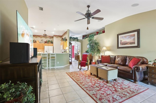 13813 Sigler St, Riverview, FL 33579 - living room with ceiling fan, arched walkways, light tile patterned floors, and visible vents