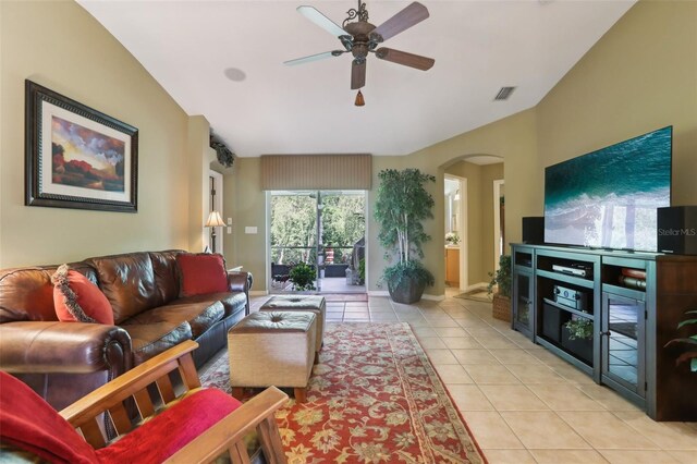 13813 Sigler St, Riverview, FL 33579 - living area featuring baseboards, light tile patterned floors, ceiling fan, visible vents, and arched walkways